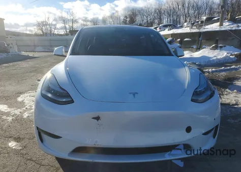 2022 Tesla Model Y from USA, damaged, VIN 7SAYGDEE2NF356391
